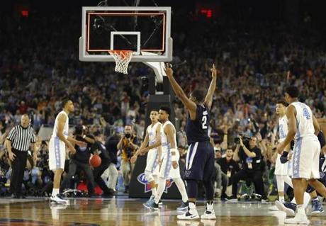 Villanova's Kris Jenkins raised his arms after hitting the game-winning shot in Monday?s NCAA title game.
